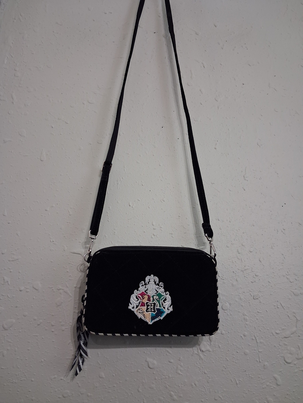 Black Quilted Crossbody Bag with Embroidered Crest
